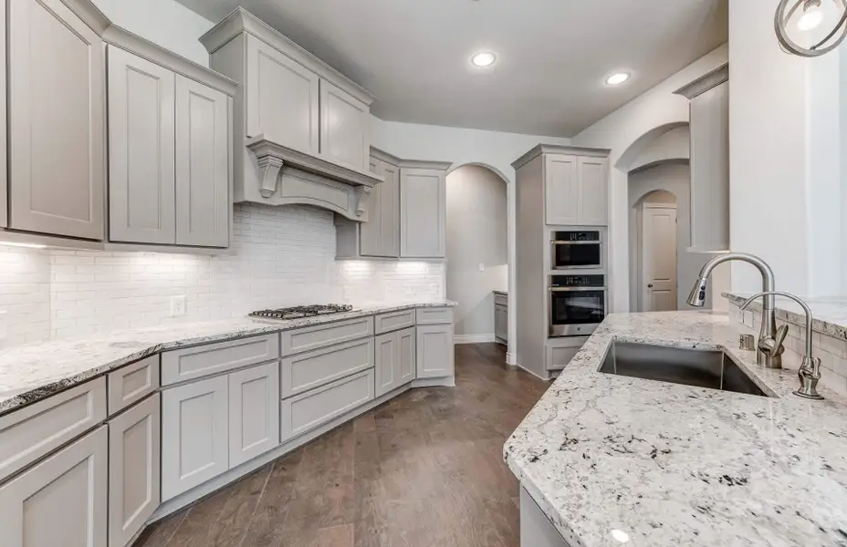 Representative furnished interior of a home built from the 3798 by Ravenna Homes in The Woodlands Hills 65′, Willis (Image 11).