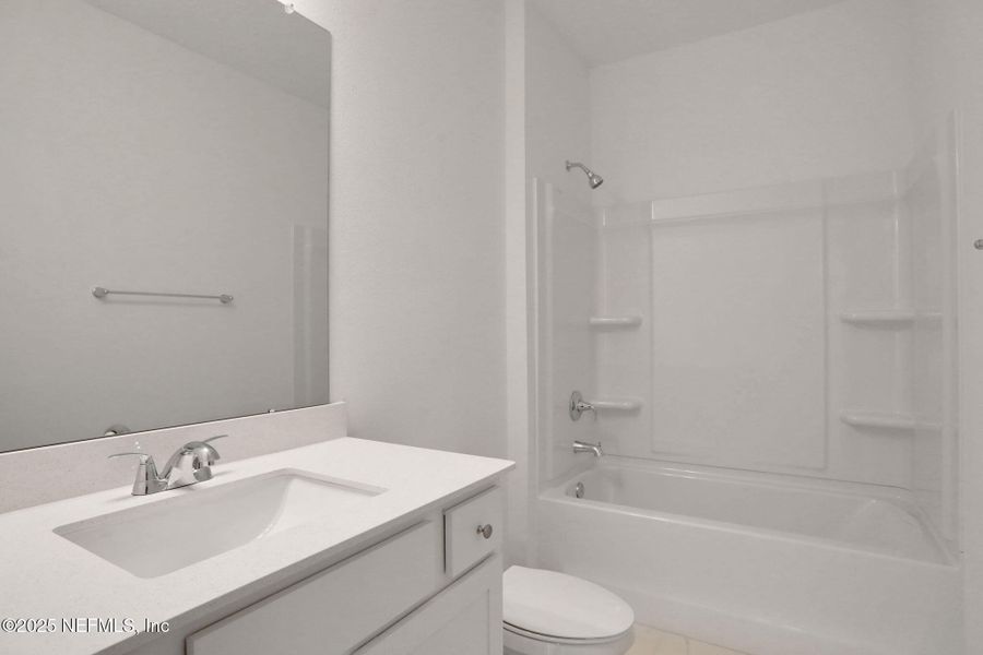 Furnished interior view inside a new home in TrailMark, St. Augustine (Image 11).