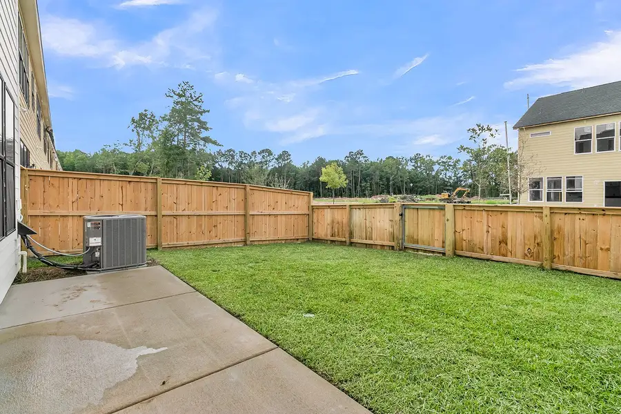 Exterior details and patio area of a home in Pineland Preserve, Summerville (Image 4).