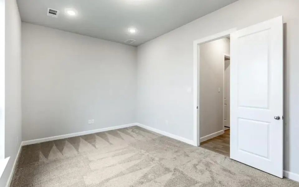 Representative unfurnished interior of a home built from the Santa Barbara by CastleRock Communities in Lakesong, Grand Prairie (Image 24).