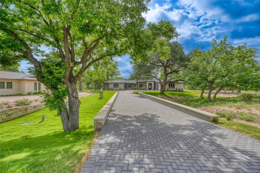 Ranch-style home with a front lawn