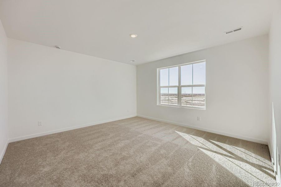 Spacious, unfurnished interior of a new home in Percheron: The Explorer Collection, Colorado Springs (Image 6).