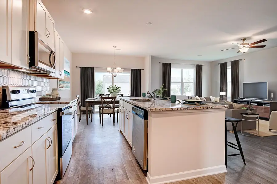 Representative furnished interior of a home built from the Bowen by McKee Homes in Pembroke, Hope Mills (Image 5).