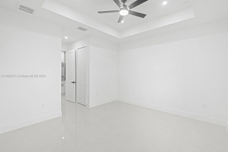 ACTUAL MAIN BEDROOM DOORS LEADING TO CLOSETS AND MAIN BATHROOM