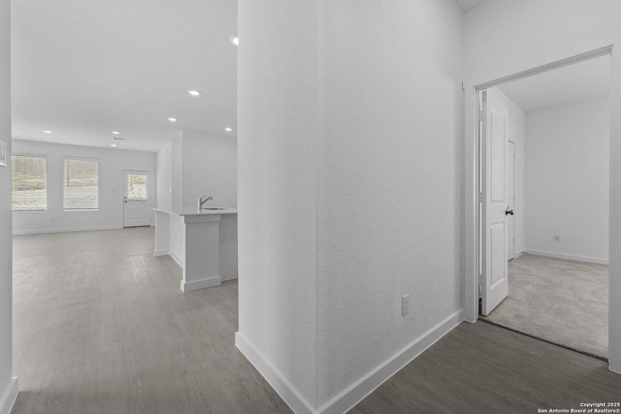 Spacious, unfurnished interior of a new home in Waterwheel: Coastline Collection, San Antonio (Image 15).