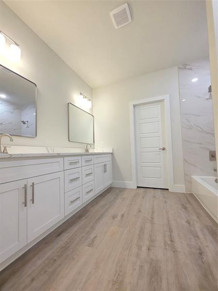 Overall view of the master/primary bathroom.