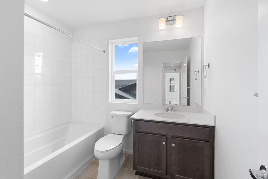 Furnished interior view inside a new home in The Cottages Collection at Ridgeline Vista, Brighton (Image 8).