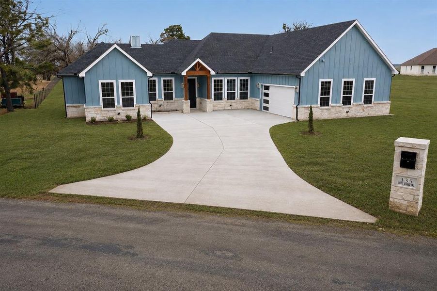 Front exterior of a new home in , Trinidad, TX, highlighting curb appeal (Image 25).
