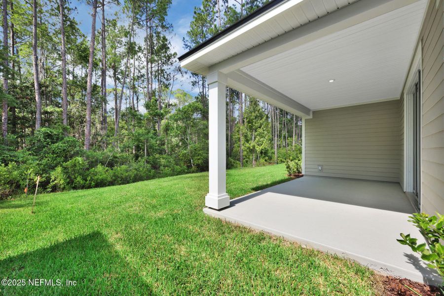 Front exterior of a new home in Trailmark - Phase 10, St. Augustine, FL, highlighting curb appeal (Image 20). Front exterior of a new home in Trailmark - Phase 10, St. Augustine, FL, highlighting curb appeal (Image 20).