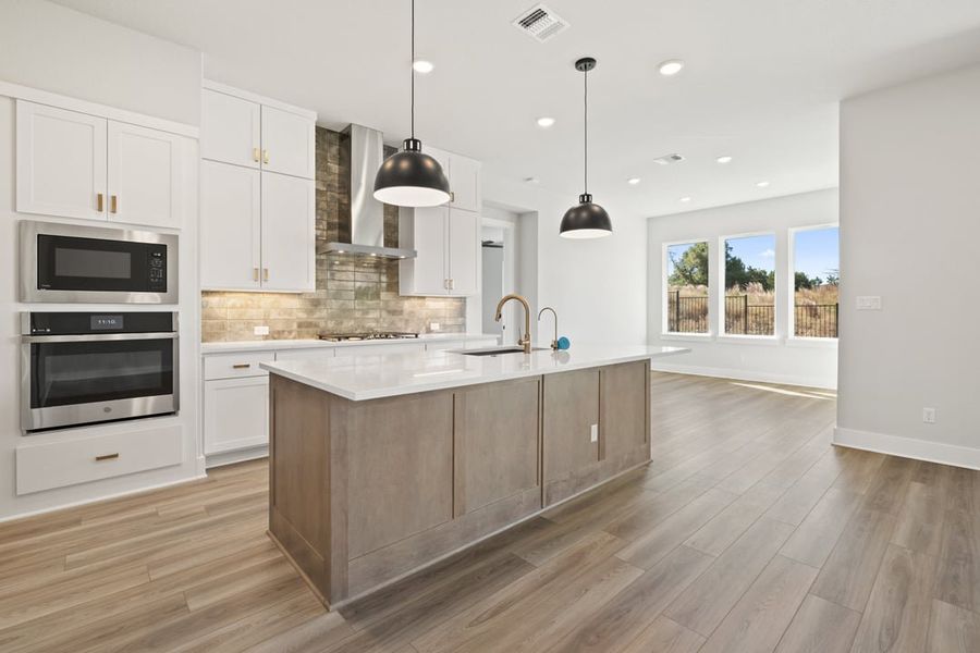 Furnished interior view inside a new home in Capitol Collection at Lariat, Liberty Hill (Image 6). Furnished interior view inside a new home in Capitol Collection at Lariat, Liberty Hill (Image 6).