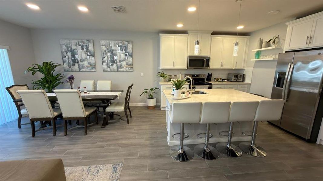 Furnished interior view inside a new home in , St. Cloud (Image 12).