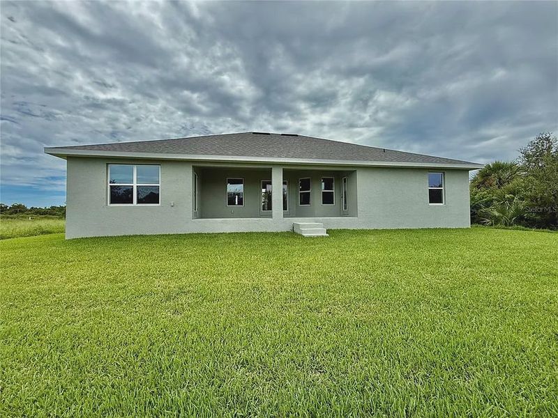 Exterior details and patio area of a home in South Gulf Cove, Port Charlotte (Image 20).