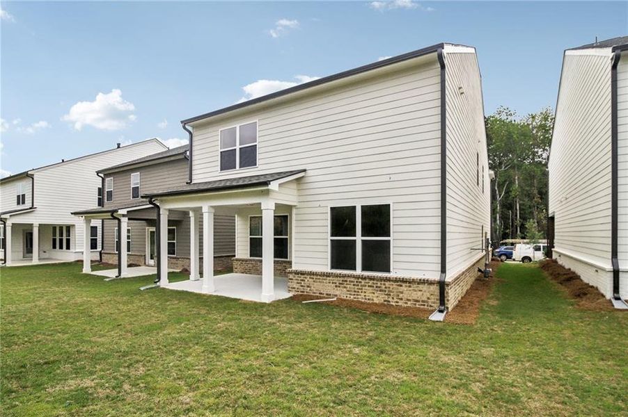 Exterior details and patio area of a home in Crofton Place Enclave, Snellville (Image 24).