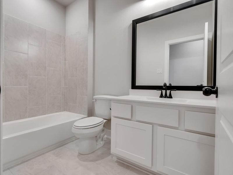 Furnished interior view inside a new home in Meridiana, Manvel (Image 16).