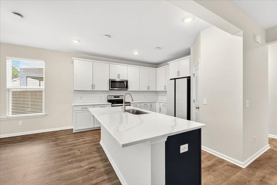 Furnished interior view inside a new home in Jasmine Point at Lakes of Cane Bay, Summerville (Image 10).