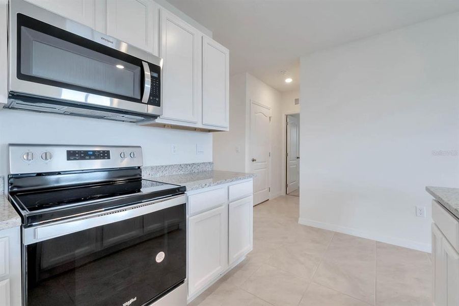 Furnished interior view inside a new home in Timberwalk, Mount Dora (Image 5).