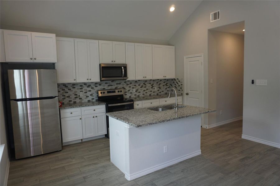 Furnished interior view inside a new home in , Willis (Image 9).
