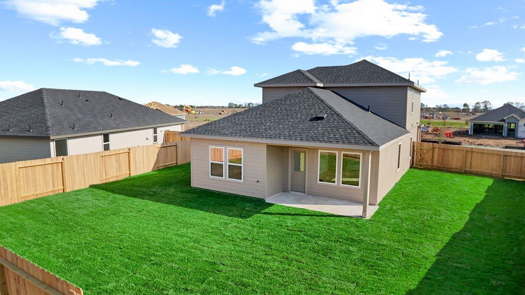 Exterior details and patio area of a home in Caldwell Crossing, Iowa Colony (Image 23).