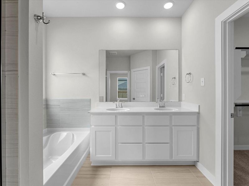 Furnished interior view inside a new home in Mason Woods, Cypress (Image 7).