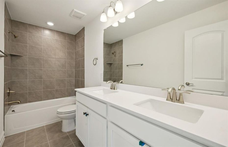 Upgraded secondary bathroom *real home pictured