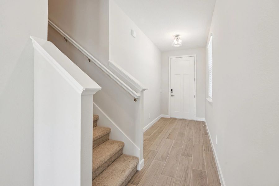 Back toward the foyer you will take the stairs to the bedrooms