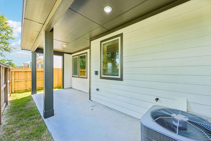Exterior details and patio area of a home in Pinewood Trails - City Series, Atascocita (Image 21). Exterior details and patio area of a home in Pinewood Trails - City Series, Atascocita (Image 21).