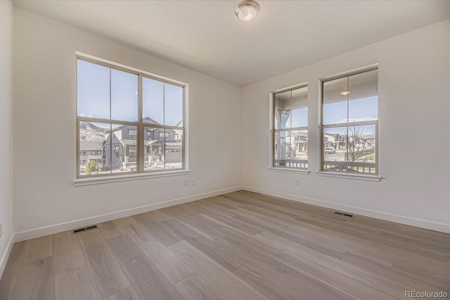 Spacious, unfurnished interior of a new home in Red Rocks Ranch: The Monarch Collection, Morrison (Image 11).