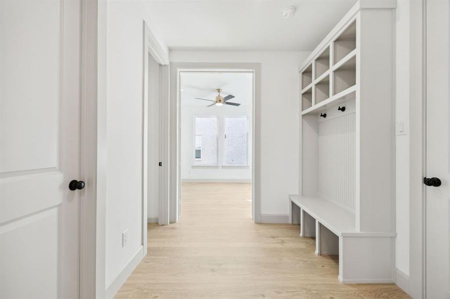 Beautiful and functional, the entire family can use this mud bench, drop zone area just inside the owner's entrance. Beautiful and functional, the entire family can use this mud bench, drop zone area just inside the owner's entrance.