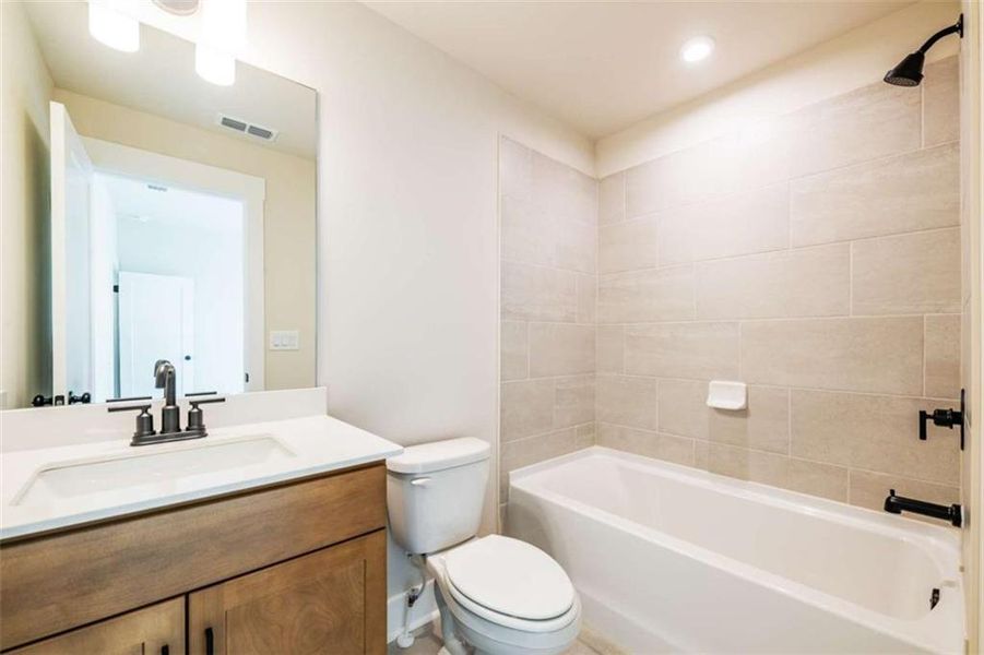 Furnished interior view inside a new home in The Paddocks at Doc Hughes, Buford (Image 33).