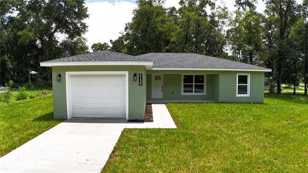 Front exterior of a new home in , Ocala, FL, highlighting curb appeal (Image 20). Front exterior of a new home in , Ocala, FL, highlighting curb appeal (Image 20).