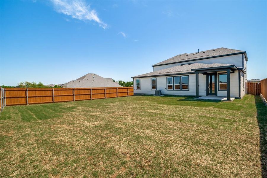 Front exterior of a new home in , Crandall, TX, highlighting curb appeal (Image 1).