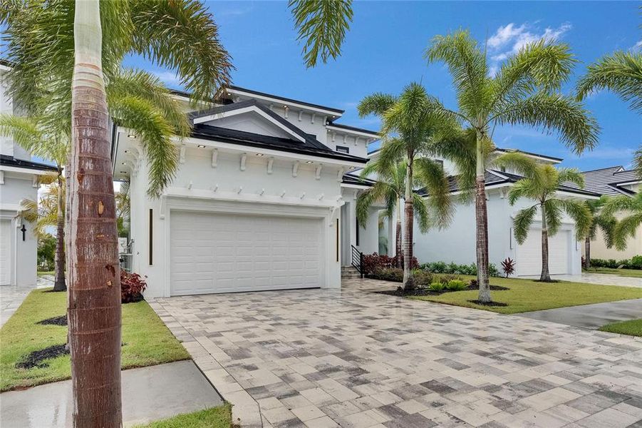 Front exterior of a new home in , Apollo Beach, FL, highlighting curb appeal (Image 33).