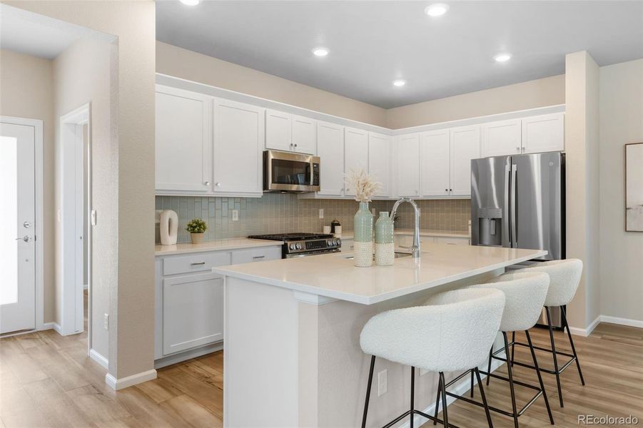 Furnished interior view inside a new home in Woodrose at Painted Prairie, Aurora (Image 34). Furnished interior view inside a new home in Woodrose at Painted Prairie, Aurora (Image 34).
