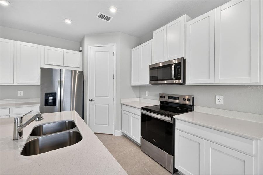 Furnished interior view inside a new home in Windwater, Parrish (Image 11).