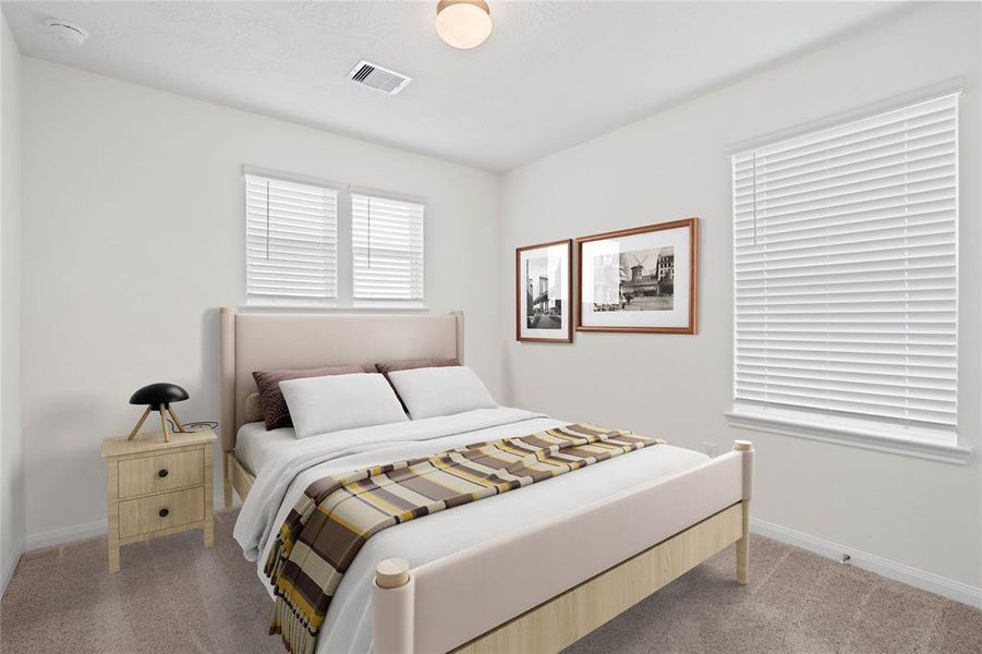 Secondary bedroom features plush carpet, neutral paint, lighting, large windows with privacy blinds and ample sized closet space.