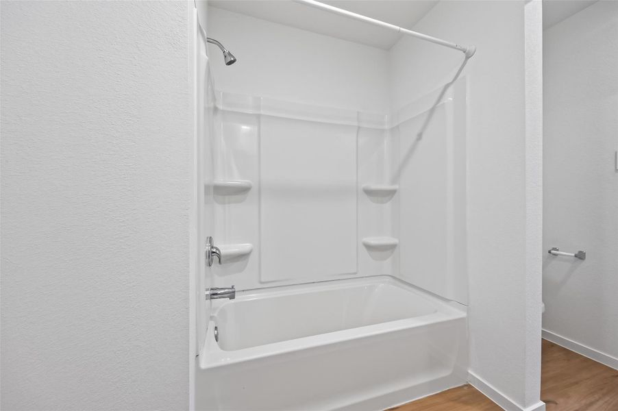 Tub shower of the master closet. Tub shower of the master closet.