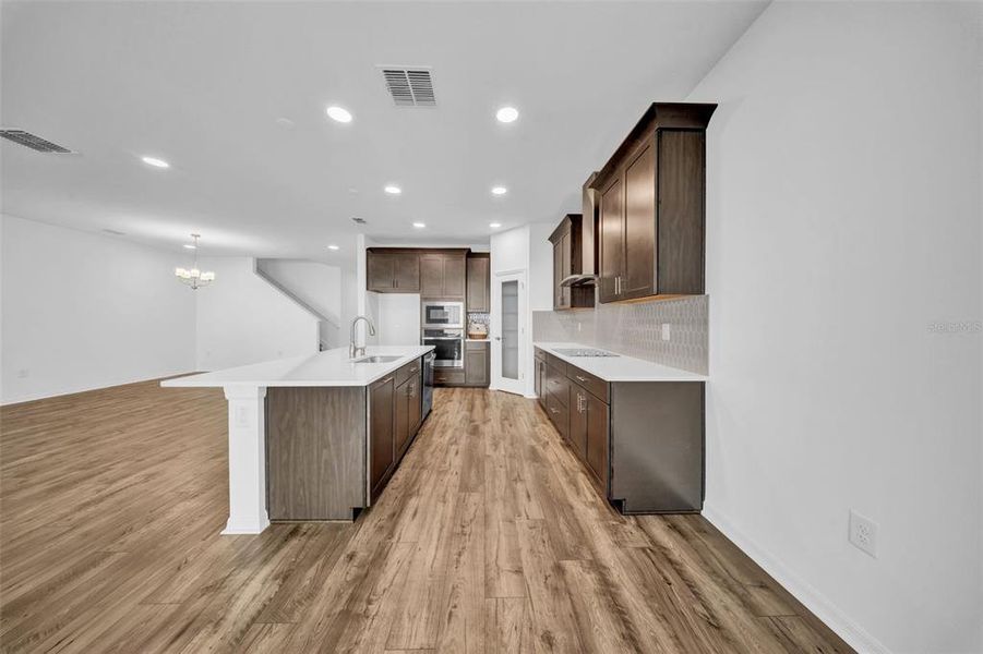 Furnished interior view inside a new home in , Wesley Chapel (Image 6).