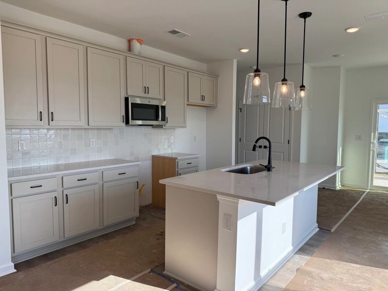 Kitchen featuring the AW Collection® Artisan - Mixed materials and warmth you can feel. Kitchen featuring the AW Collection® Artisan - Mixed materials and warmth you can feel.