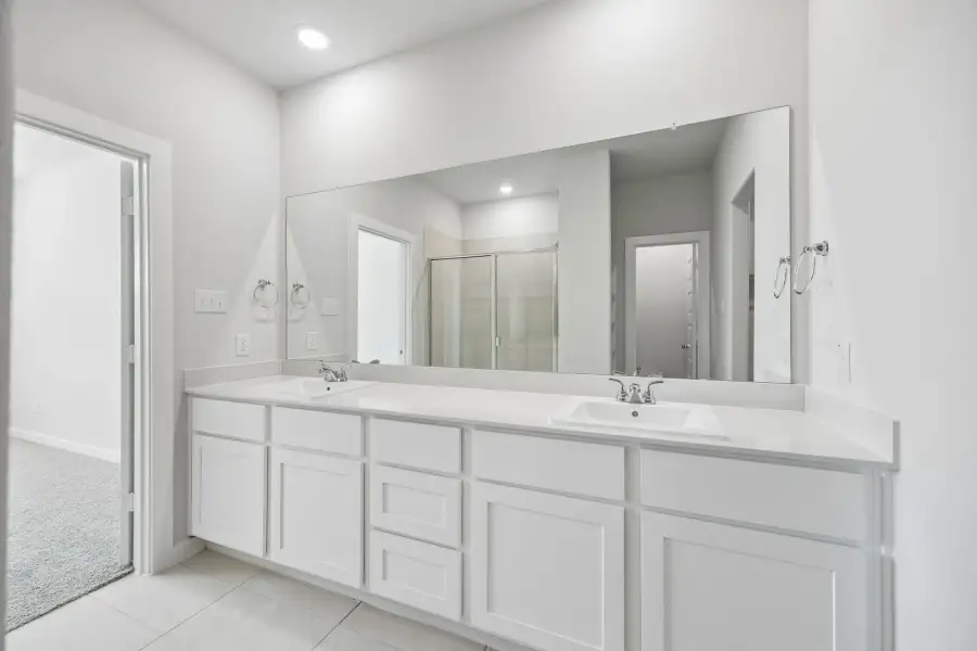 Primary Bathroom in the Mesquite home plan by Trophy Signature Homes – REPRESENTATIVE PHOTO Primary Bathroom in the Mesquite home plan by Trophy Signature Homes – REPRESENTATIVE PHOTO