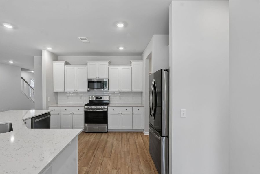 Furnished interior view inside a new home in Sweetgrass at Summers Corner, Summerville (Image 18).