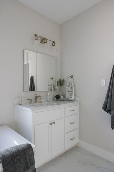 Representative furnished interior of a home built from the The Ellen II by Reece Homes in Pebble Creek, College Station (Image 40).