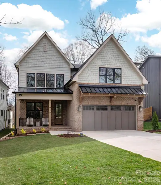 Front exterior of a new home in , Charlotte, NC, highlighting curb appeal (Image 2). Front exterior of a new home in , Charlotte, NC, highlighting curb appeal (Image 2).