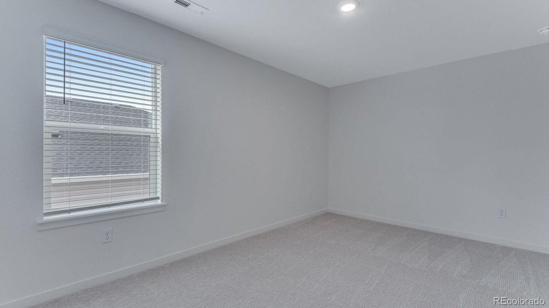 Spacious, unfurnished interior of a new home in Trails at Crowfoot, Parker (Image 34).