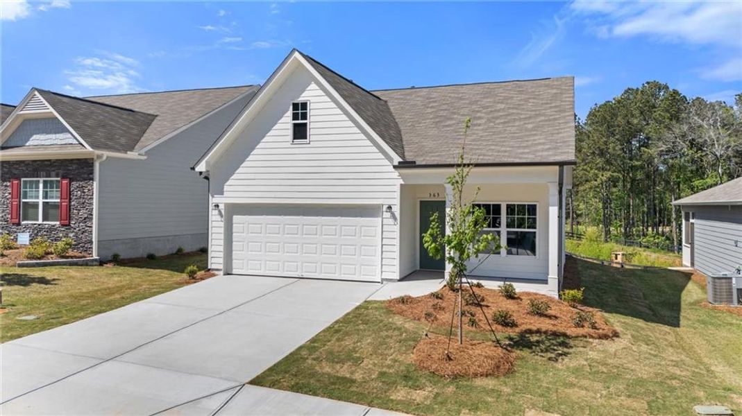 Front exterior of a new home in Villages at Cedar Hill, Dallas, GA, highlighting curb appeal (Image 2).