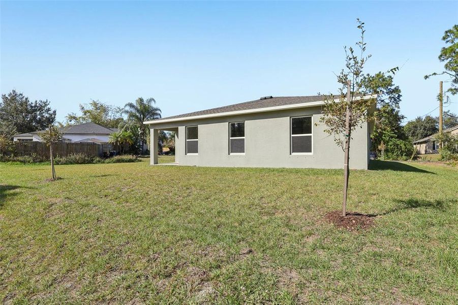 Exterior details and patio area of a home in Palm Bay Classic, Palm Bay (Image 7).