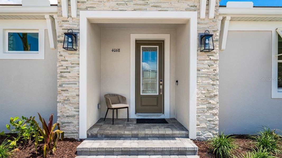 Exterior details and patio area of a home in Esplanade at Azario Lakewood Ranch, Lakewood Ranch (Image 24).