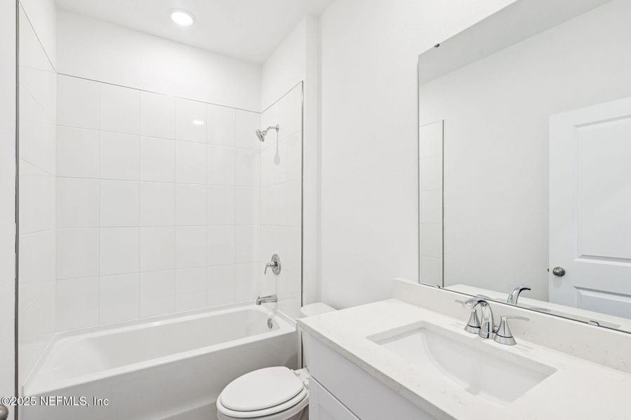 Furnished interior view inside a new home in Lakes at Bella Lago - Signature Series, Green Cove Springs (Image 5).