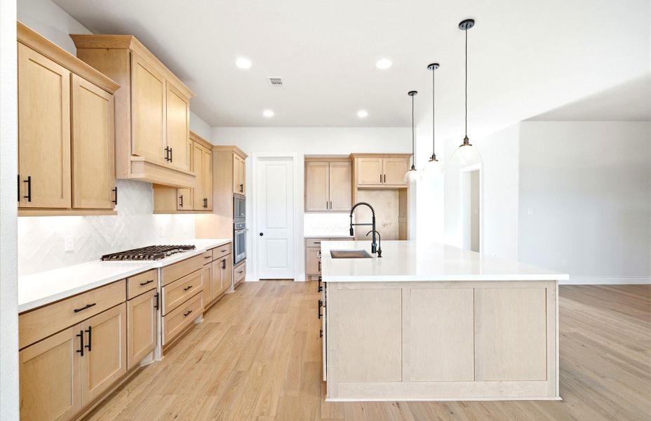 Furnished interior view inside a new home in Bridgeland 50', Cypress (Image 12).