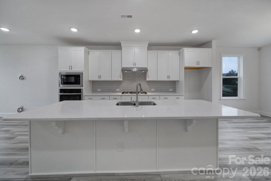Furnished interior view inside a new home in , Concord (Image 7).