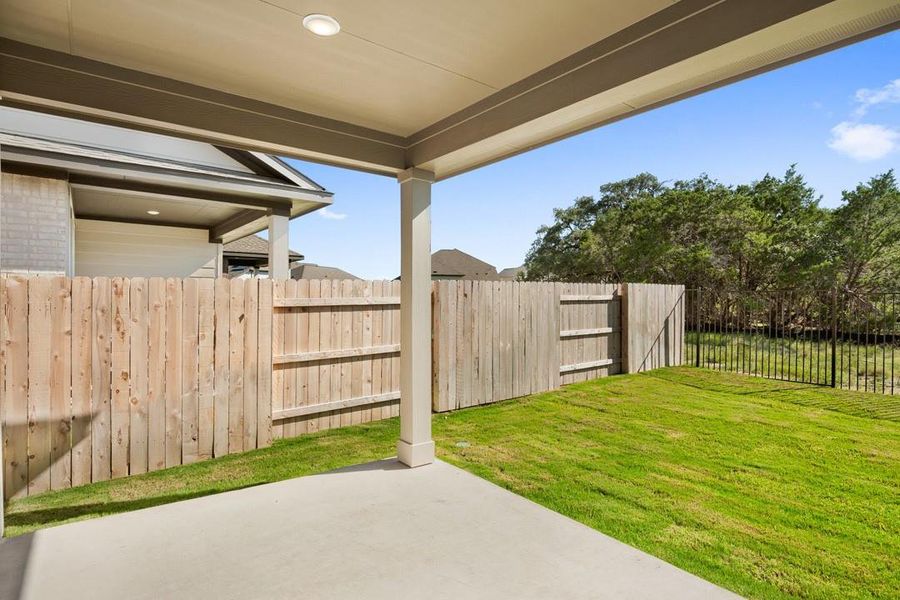 Front exterior of a new home in Terrace Collection at Lariat, Liberty Hill, TX, highlighting curb appeal (Image 21). Front exterior of a new home in Terrace Collection at Lariat, Liberty Hill, TX, highlighting curb appeal (Image 21).
